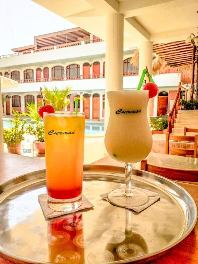 Hotel Curasi Ика Екстериор снимка